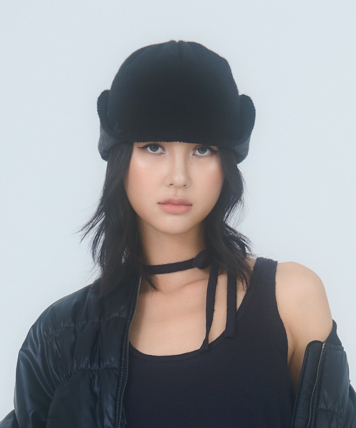 running-high-fw-24-earflap-jacquard-beanie-(black)